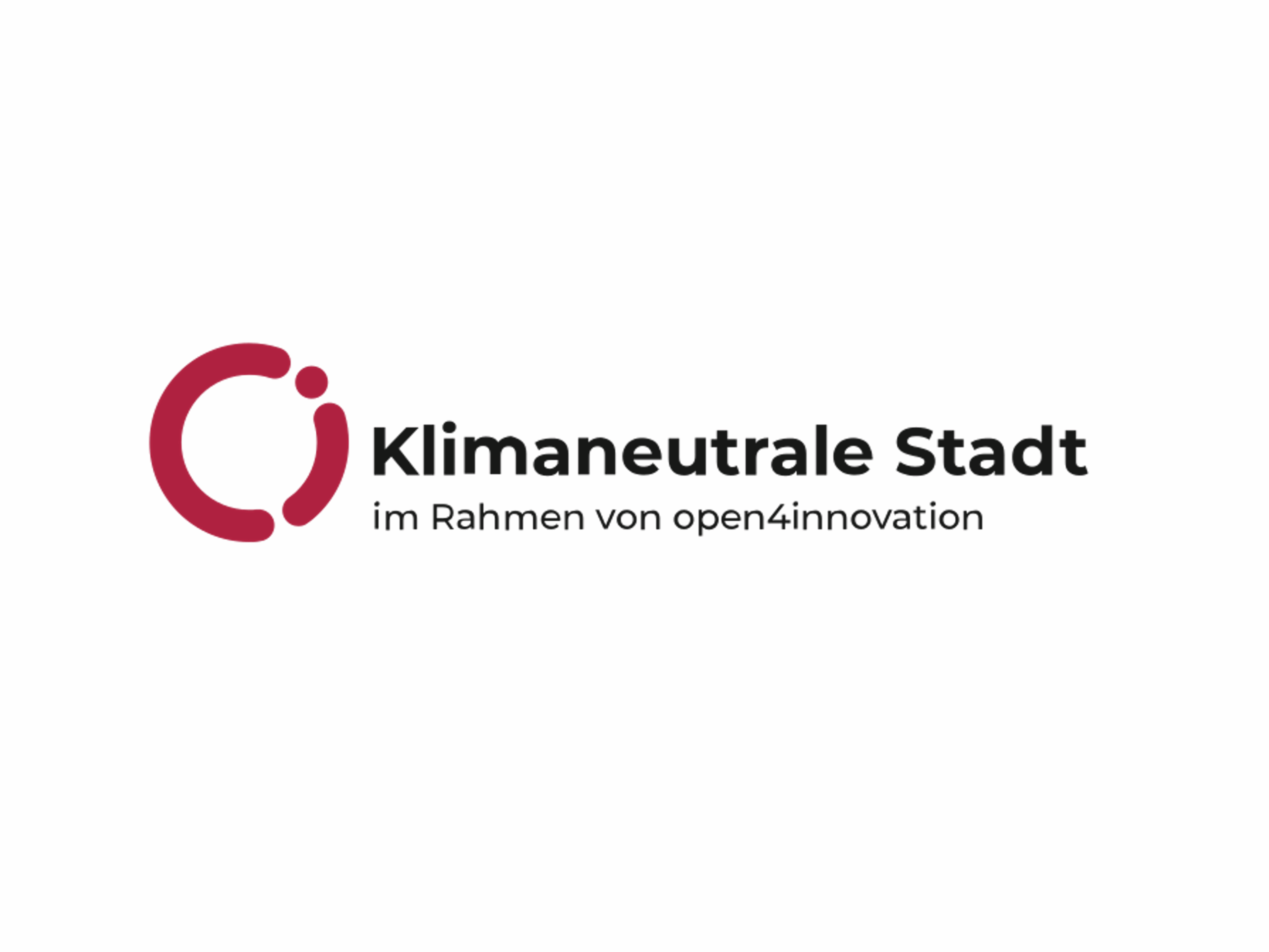 Logo der Klimaneutralen Stadt mit rotem Kreis und schwarzem Text 'Klimaneutrale Stadt im Rahmen von open4innovation'.