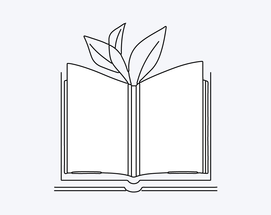 Symbolbild eines Buchs mit Blättern am Rand.